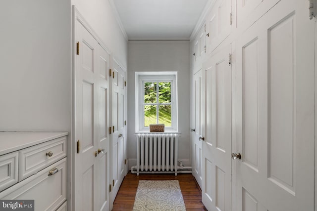 11 Conshohocken State Rd, Gladwyne, PA 19035 - doorway to outside featuring radiator, dark wood-type flooring, crown molding, and baseboards
