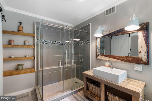 11 Conshohocken State Rd, Gladwyne, PA 19035 - full bath with a sink, crown molding, and a shower stall