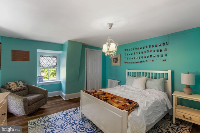 11 Conshohocken State Rd, Gladwyne, PA 19035 - bedroom with a chandelier, wood finished floors, baseboards, a closet, and radiator heating unit