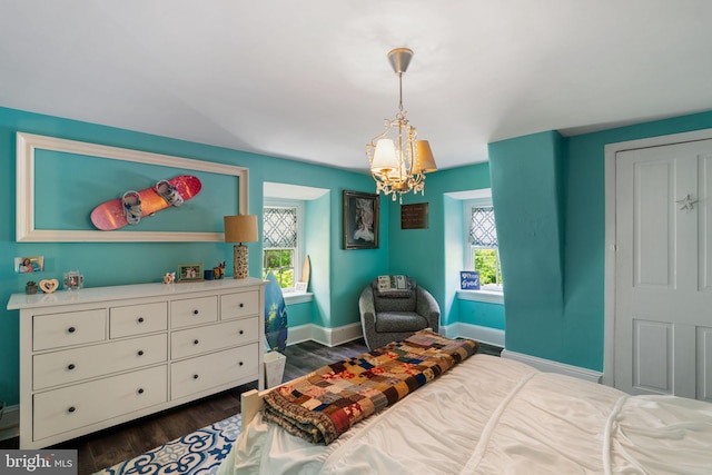11 Conshohocken State Rd, Gladwyne, PA 19035 - bedroom with a chandelier, multiple windows, baseboards, and dark wood finished floors