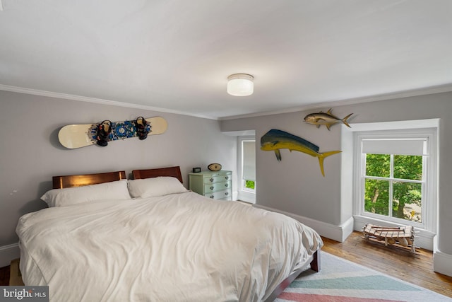 11 Conshohocken State Rd, Gladwyne, PA 19035 - bedroom featuring crown molding, wood finished floors, and baseboards