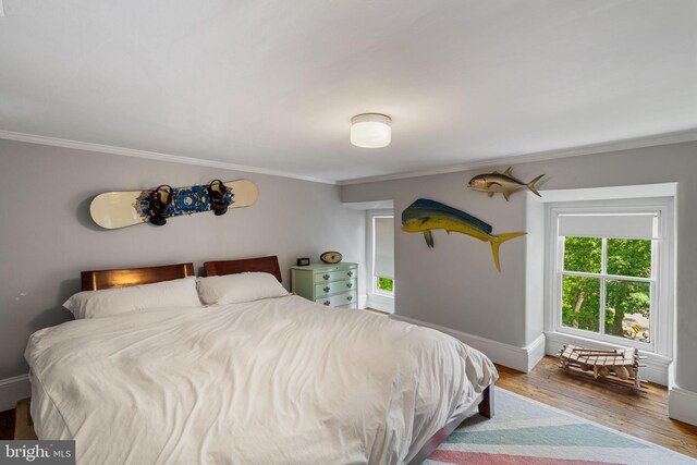 11 Conshohocken State Rd, Gladwyne, PA 19035 - bedroom featuring crown molding, wood finished floors, and baseboards