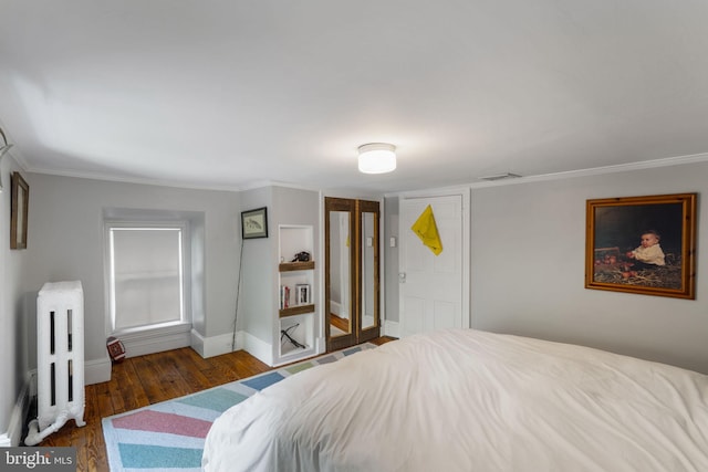 11 Conshohocken State Rd, Gladwyne, PA 19035 - bedroom with wood finished floors, radiator heating unit, ornamental molding, and baseboards
