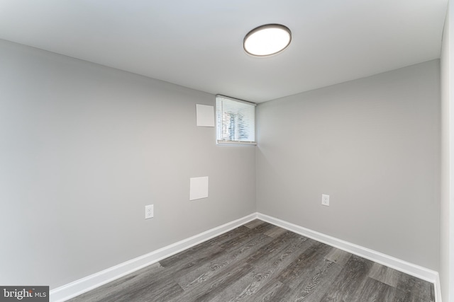 1607 Saint Stephens St, Baltimore, MD 21216 - empty room with dark wood-style floors and baseboards