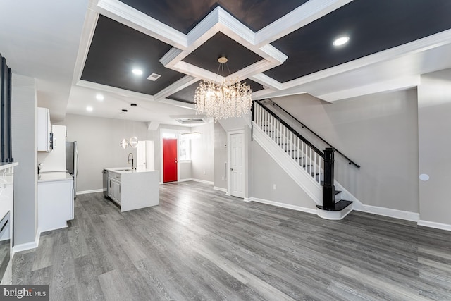 1607 Saint Stephens St, Baltimore, MD 21216 - unfurnished living room with a sink, a chandelier, coffered ceiling, baseboards, and dark wood-type flooring