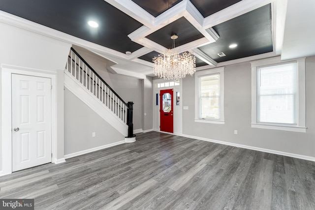 1607 Saint Stephens St, Baltimore, MD 21216 - entrance foyer with a chandelier, wood finished floors, stairway, coffered ceiling, and ornamental molding