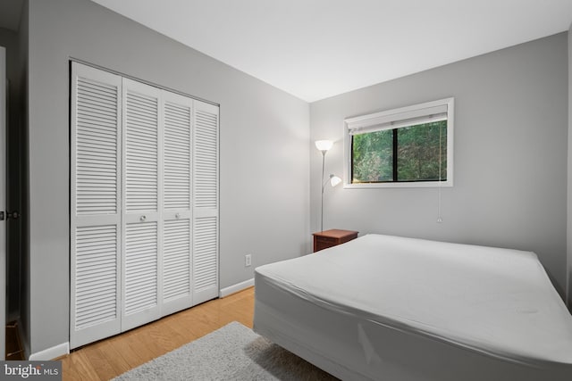 2702 Dartmouth Rd Unit 3, Alexandria, VA 22314 - bedroom featuring a closet, wood finished floors, and baseboards