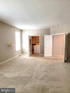 339 Carlisle Dr, Avondale, PA 19311 - unfurnished living room with carpet floors and baseboards