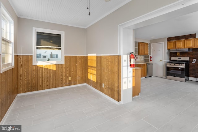 16 Woodside Ln, Keansburg, NJ 07734 - unfurnished dining area with wainscoting and wooden walls