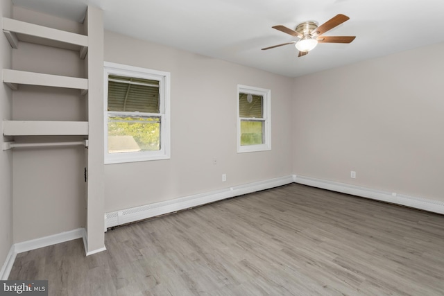16 Woodside Ln, Keansburg, NJ 07734 - unfurnished bedroom with wood finished floors, baseboards, and ceiling fan