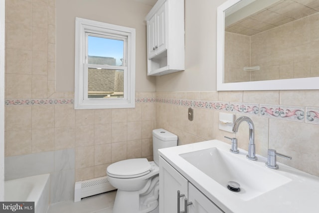 16 Woodside Ln, Keansburg, NJ 07734 - full bath with baseboard heating, vanity, a tub to relax in, toilet, and tile walls