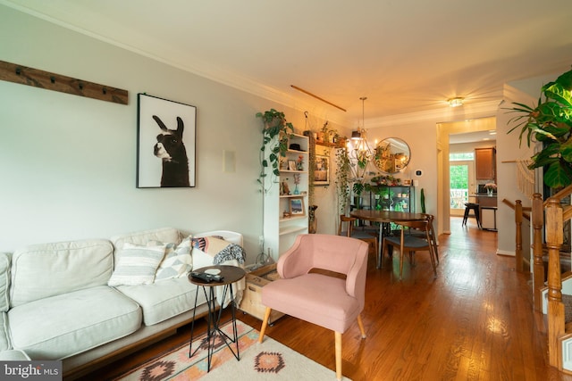 20468 Alicent Ter, Ashburn, VA 20147 - living room featuring a chandelier, wood finished floors, and crown molding