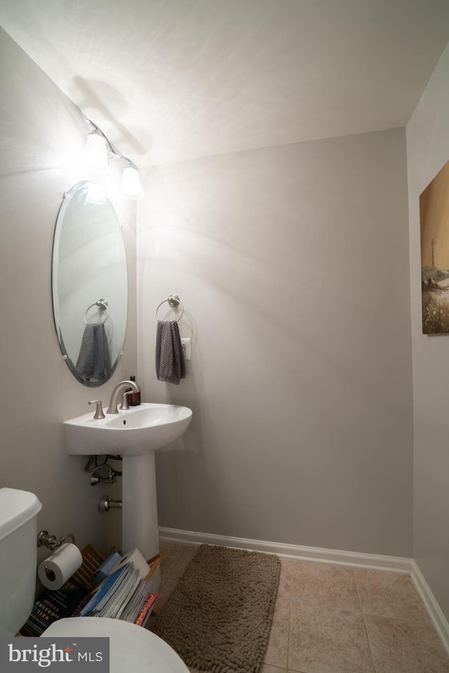 20468 Alicent Ter, Ashburn, VA 20147 - bathroom featuring toilet and tile patterned flooring