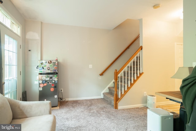 20468 Alicent Ter, Ashburn, VA 20147 - living area featuring stairs and carpet flooring