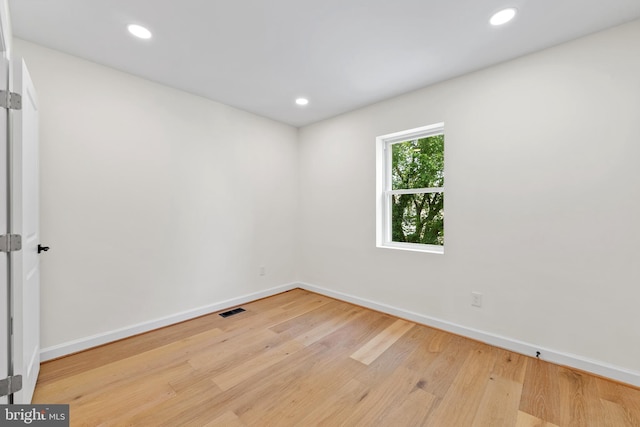 713 Tewkesbury Pl NW, Washington, DC 20012 - empty room with baseboards, wood finished floors, and recessed lighting