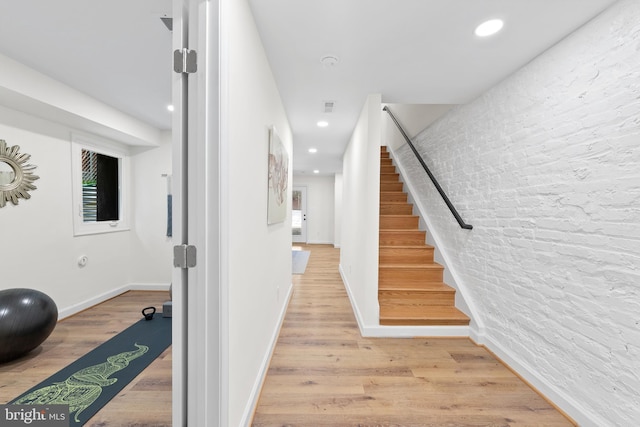 713 Tewkesbury Pl NW, Washington, DC 20012 - stairway with recessed lighting, wood finished floors, and baseboards