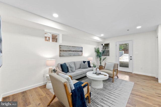 713 Tewkesbury Pl NW, Washington, DC 20012 - living room with baseboards, light wood-style floors, and recessed lighting