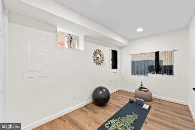 713 Tewkesbury Pl NW, Washington, DC 20012 - exercise area with electric panel, baseboards, wood finished floors, and recessed lighting