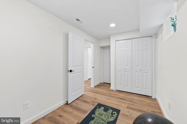 713 Tewkesbury Pl NW, Washington, DC 20012 - unfurnished bedroom with baseboards, light wood finished floors, recessed lighting, and a closet