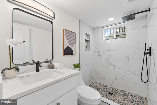 713 Tewkesbury Pl NW, Washington, DC 20012 - full bathroom featuring vanity, toilet, a marble finish shower, and recessed lighting