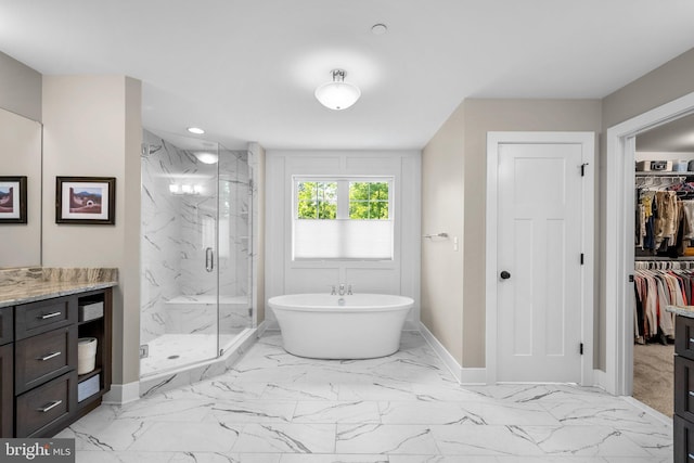 904 Misty Manor Ln, Millersville, MD 21108 - full bathroom with marble finish floors, a marble finish shower, a freestanding bath, and recessed lighting
