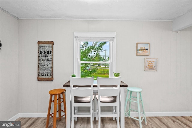 412 Marshall Ave, Colonial Beach, VA 22443 - dining room with wood finished floors, baseboards, and ornamental molding