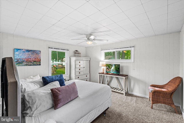 412 Marshall Ave, Colonial Beach, VA 22443 - bedroom featuring carpet floors, ceiling fan, baseboards, and wood walls