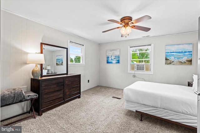 412 Marshall Ave, Colonial Beach, VA 22443 - bedroom with multiple windows, carpet, cooling unit, and ceiling fan