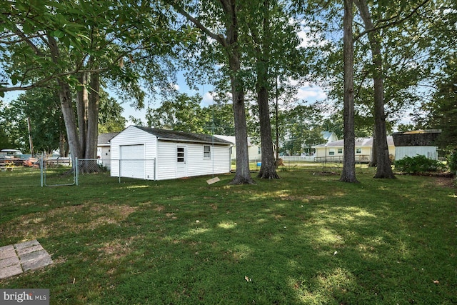 412 Marshall Ave, Colonial Beach, VA 22443 - view of yard with a garage and an outdoor structure