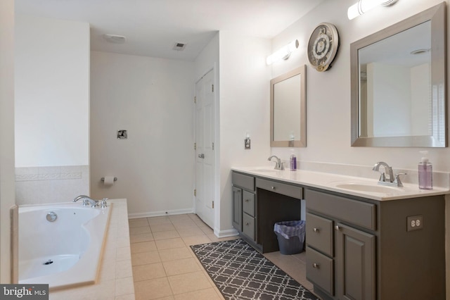 2652 Academic Ct, Waldorf, MD 20603 - bathroom featuring double vanity, a garden tub, tile patterned flooring, and baseboards