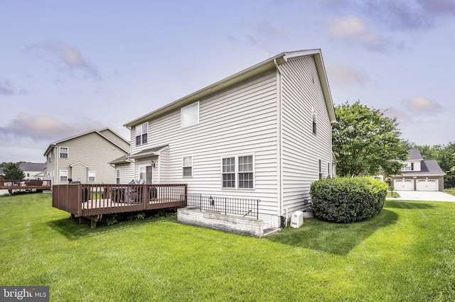 2652 Academic Ct, Waldorf, MD 20603 - rear view of house with a deck and a lawn