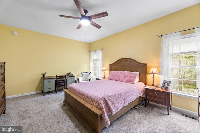 240 Charleston Rd, Ocean Pines, MD 21811 - bedroom with multiple windows, carpet floors, and ceiling fan