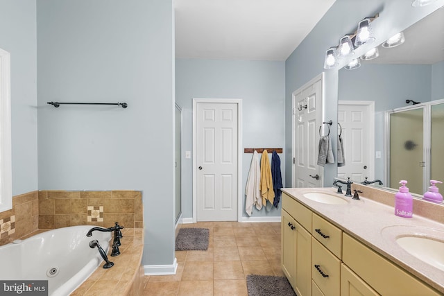 240 Charleston Rd, Ocean Pines, MD 21811 - bathroom with a shower stall, double vanity, a whirlpool tub, and tile patterned flooring