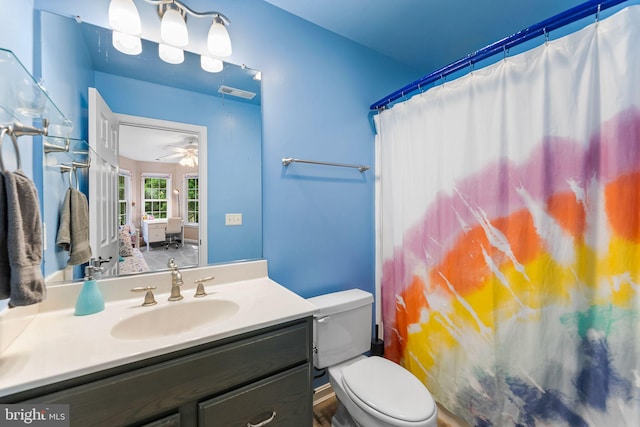 240 Charleston Rd, Ocean Pines, MD 21811 - full bath featuring vanity, curtained shower, and a ceiling fan
