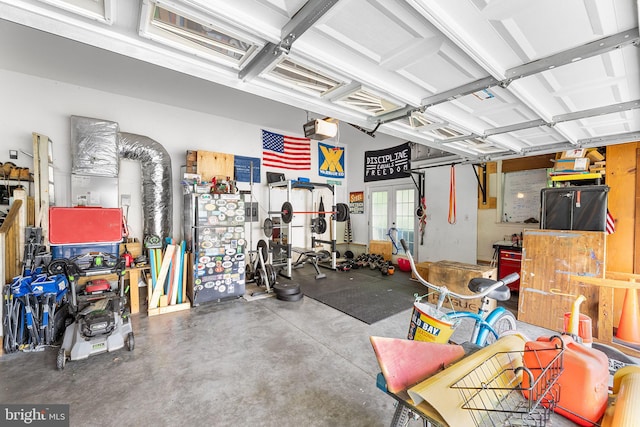 240 Charleston Rd, Ocean Pines, MD 21811 - garage featuring a garage door opener