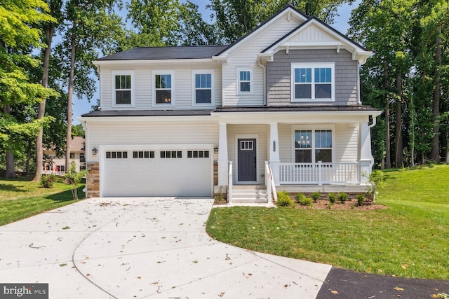 4010 Milner Rd, Nottingham, MD 21236 - view of front of house with a porch, a garage, driveway, and a front yard