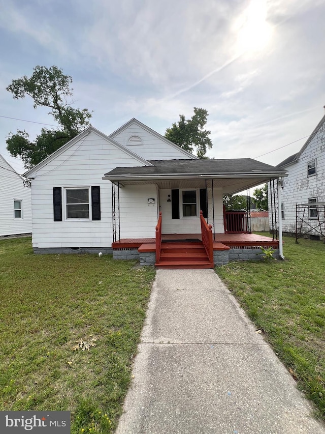 309 Marshall St, Salisbury, MD 21804 - view of front facade with a porch, a front lawn, and crawl space
