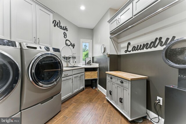 415 Pyles Mountain Ln, Avondale, PA 19311 - washroom with independent washer and dryer, dark wood-type flooring, cabinet space, and recessed lighting