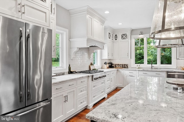 415 Pyles Mountain Ln, Avondale, PA 19311 - kitchen featuring stainless steel appliances, white cabinets, tasteful backsplash, wall chimney range hood, and recessed lighting