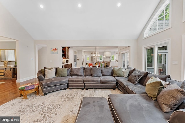 415 Pyles Mountain Ln, Avondale, PA 19311 - living area with wood finished floors, a chandelier, high vaulted ceiling, and recessed lighting