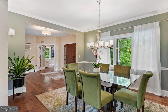 415 Pyles Mountain Ln, Avondale, PA 19311 - dining area with plenty of natural light, wood finished floors, a chandelier, and ornamental molding
