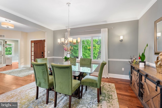 415 Pyles Mountain Ln, Avondale, PA 19311 - dining area with a chandelier, wood finished floors, and ornamental molding