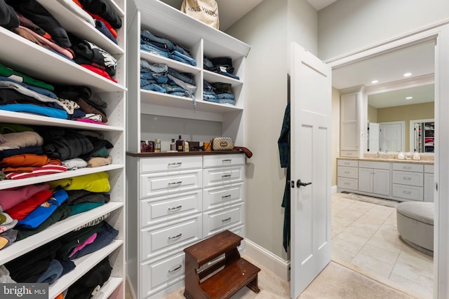 415 Pyles Mountain Ln, Avondale, PA 19311 - walk in closet with a sink and light tile patterned floors
