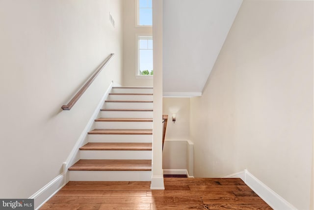 415 Pyles Mountain Ln, Avondale, PA 19311 - staircase with wood finished floors and baseboards