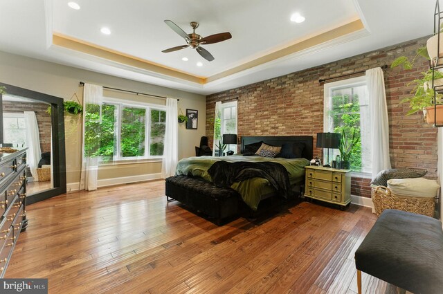 415 Pyles Mountain Ln, Avondale, PA 19311 - bedroom featuring a raised ceiling, hardwood / wood-style flooring, brick wall, recessed lighting, and ceiling fan