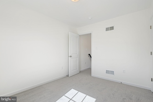 87 Eagle Ln Unit 5, Hanover, PA 17331 - empty room with carpet and a smoke detector