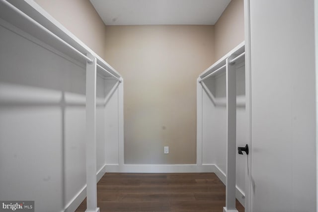 504 Kingsley Rd SW, Vienna, VA 22180 - walk in closet with dark wood-style floors