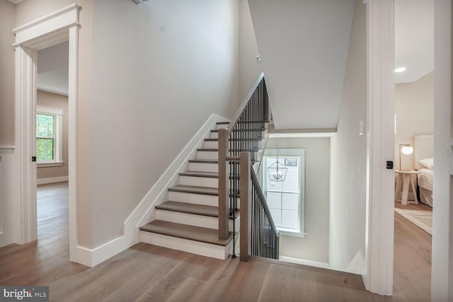 504 Kingsley Rd SW, Vienna, VA 22180 - stairs featuring wood finished floors and baseboards