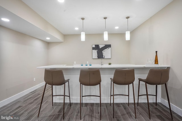 504 Kingsley Rd SW, Vienna, VA 22180 - bar featuring wood finish floors, recessed lighting, and pendant lighting