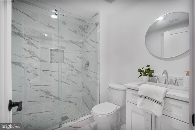 504 Kingsley Rd SW, Vienna, VA 22180 - full bathroom featuring vanity, a marble finish shower, and marble look tile flooring